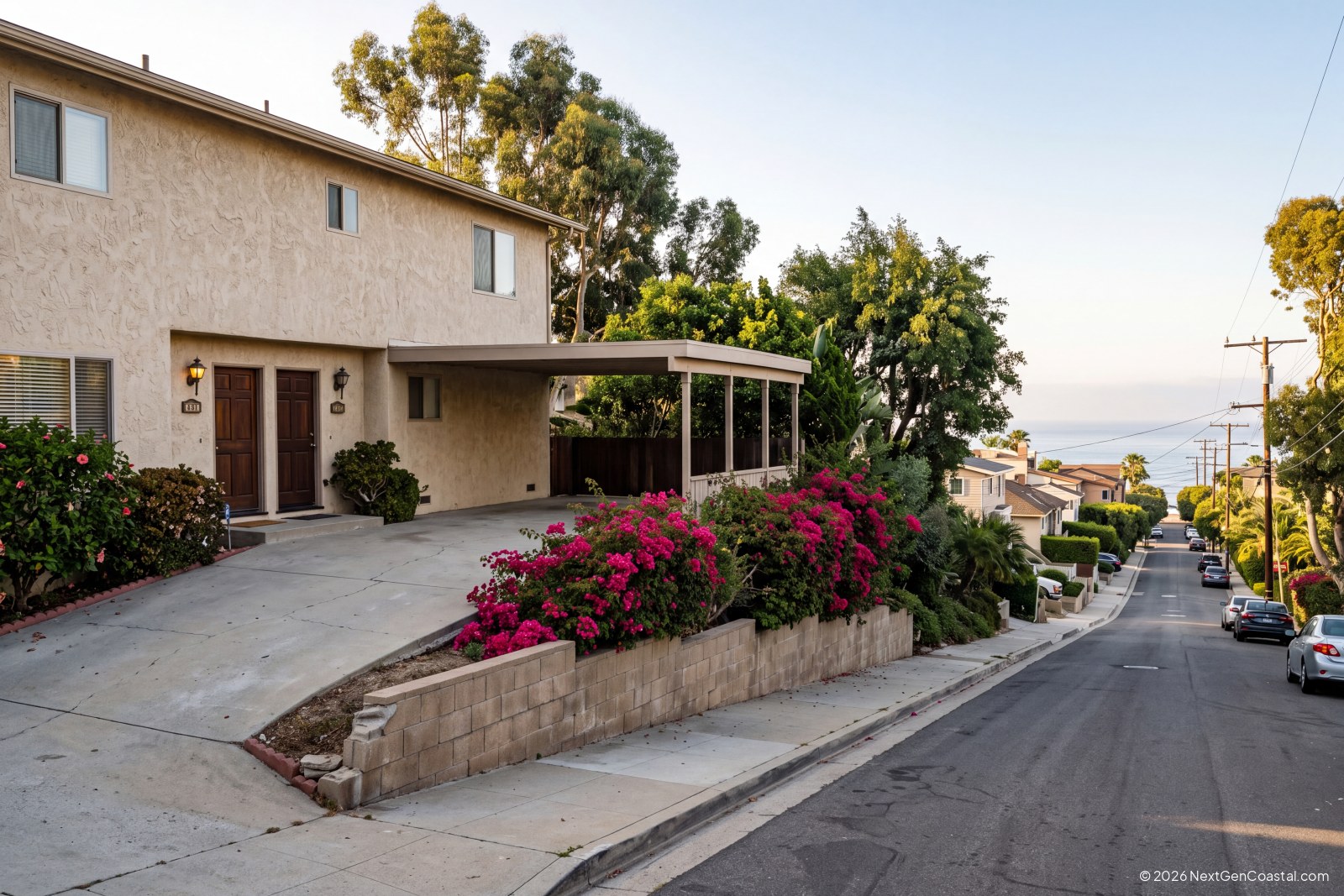 Mid-century hillside duplex rental in coastal Southern California with distant ocean glimpse